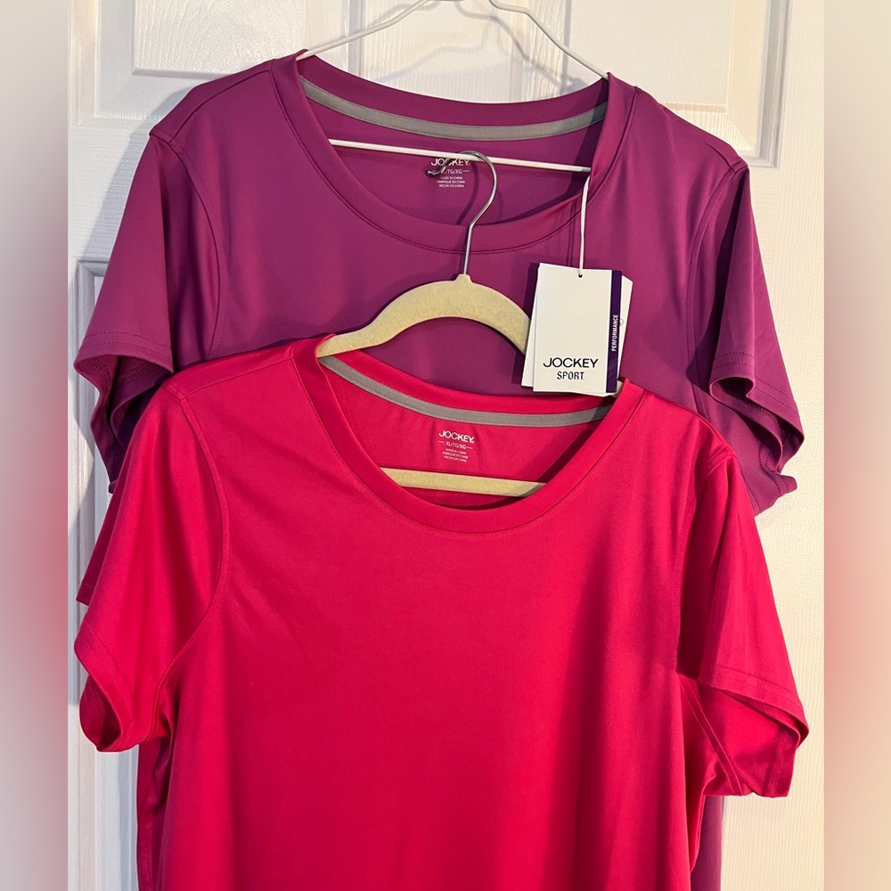 Two Jockey sport performance shirts, pink and purple. Moisture wicking size XL
